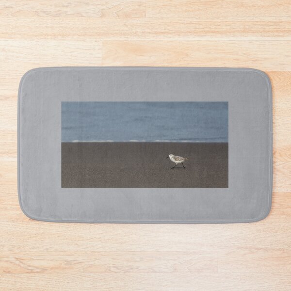 Item preview, Sanderling walking in sand, at the Atlantic Ocean. designed and sold by AylaHarbich.