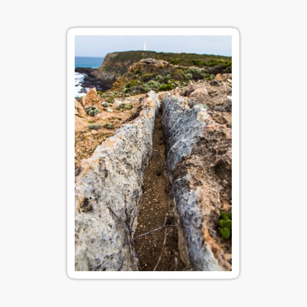 Rugged Australian coastline looking out to the Cape Nelson Lighthouse along the Great Ocean Road Sticker