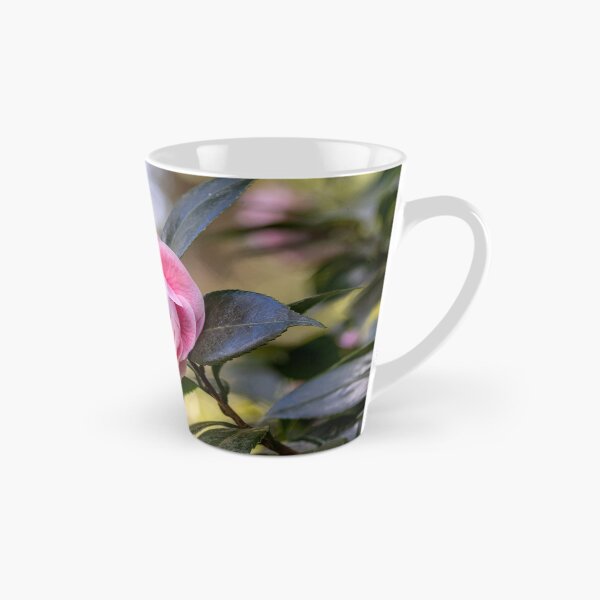 Item preview, Pink camellia flower, with branches and leaves in the background. designed and sold by AylaHarbich.