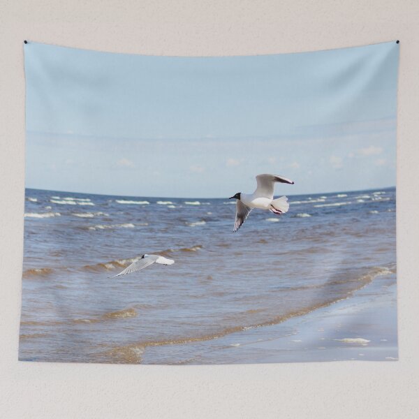 Item preview, Two seagulls flying above the water designed and sold by lena-maximova.