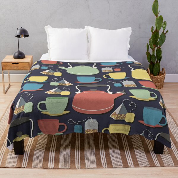 Item preview, Colorful tea set pattern of a kettle, tea cups, and tea bags in green, yellow, red and blue with dark blue background designed and sold by CiniArt.