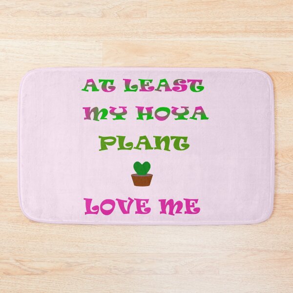Item preview, At least my hoya plant love me text on the light pink background designed and sold by IraNiva.
