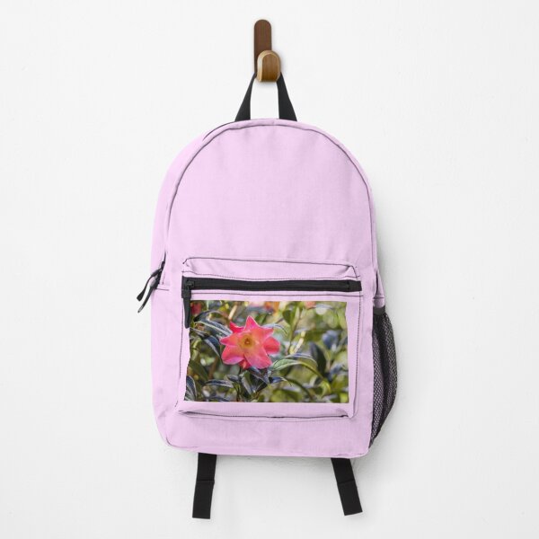 Item preview, Pink camellia flower, with branches and leaves in the background. designed and sold by AylaHarbich.
