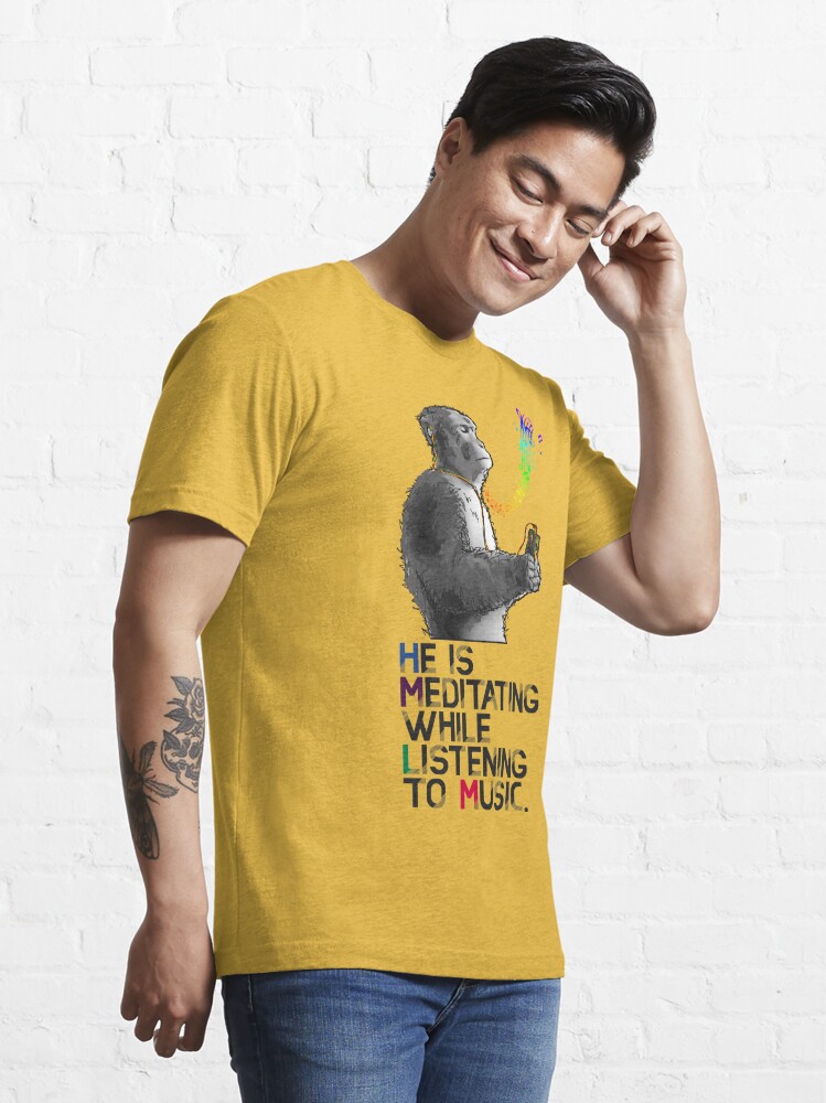 A monkey is meditating while listening to music. | Essential T-Shirt