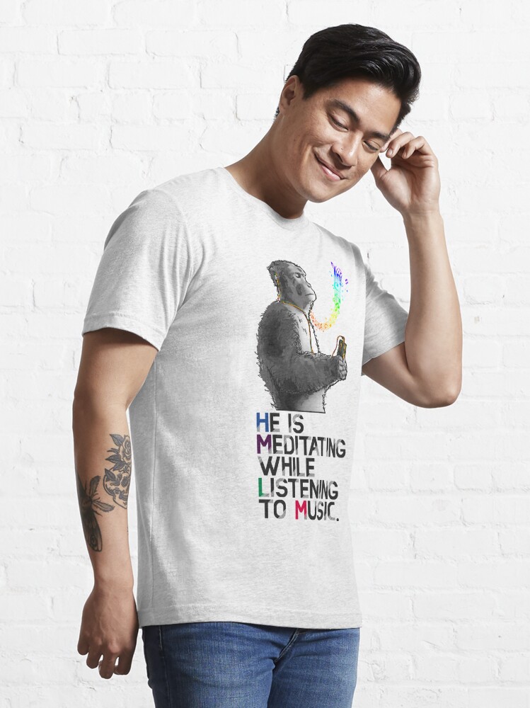 A monkey is meditating while listening to music. | Essential T-Shirt