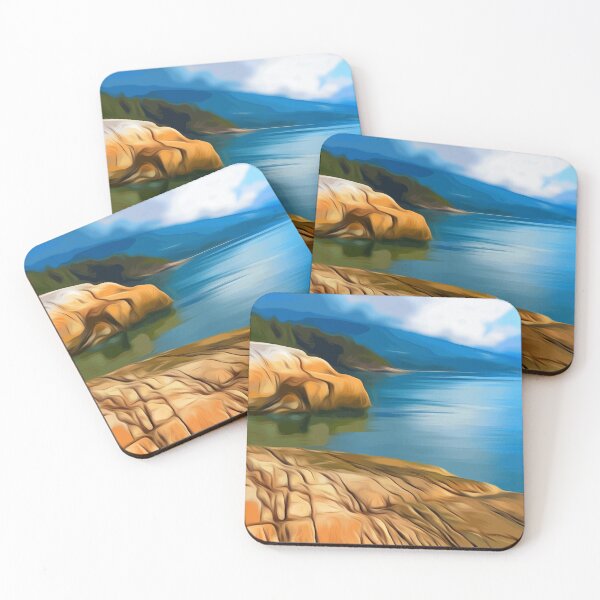 Item preview, Blue lake with rocky shoreline and mountains in the background. designed and sold by Spindriftmerch.