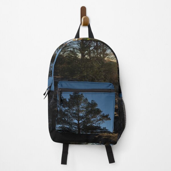 Item preview, Glaring sunset between trees designed and sold by frankuffmann.
