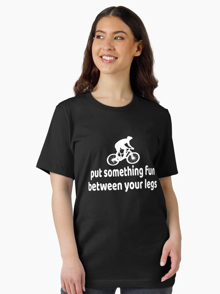 Thumbnail 2 of 7, Essential T-Shirt, Put something fun between your legs funny Cycling quote for Cyclist,Cycling lovers,biking lovers,Mountain biking,cycling gift,cyclist dad,boyfriend gift,birthday gift designed and sold by khalilfennich.