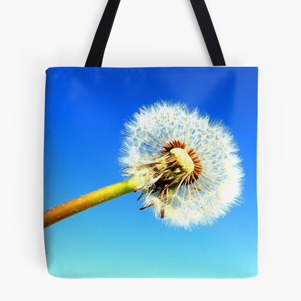 Item preview, Dandelion puff against blue sky designed and sold by angel1.