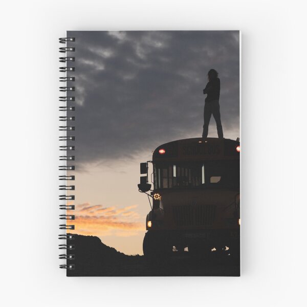 Item preview, man in black jacket standing on top of yellow bus during sunset designed and sold by buucake.