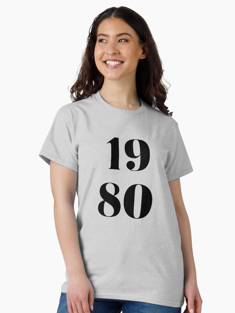 Thumbnail 1 of 7, Classic T-Shirt, 1980 birth year designed and sold by Fatamimosh.