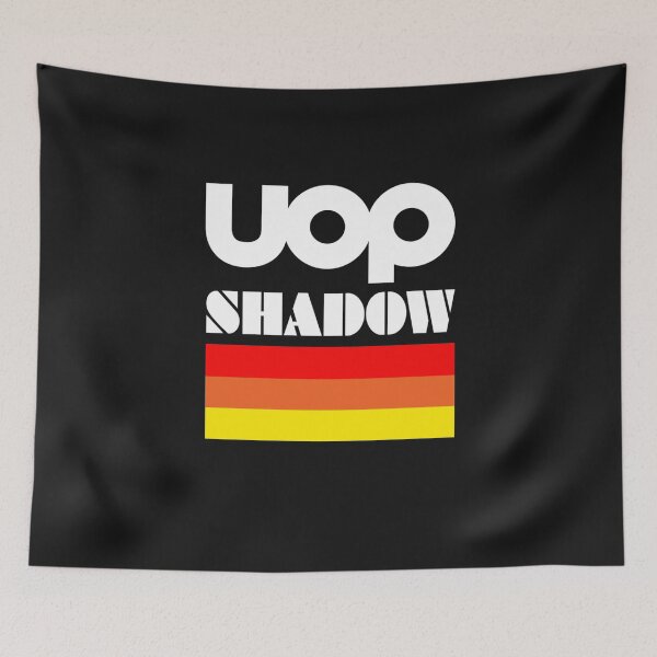 Item preview, UOP Shadow retro F1 sponsor block logo  Essential T-Shirt designed and sold by lillaboyer79.