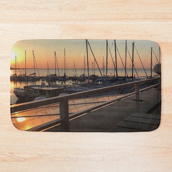 Item preview, Peaceful sunset over marina with sailboat mast on Baltic sea in Langballig yachting harbor, Schleswig- Flensburg, Germany  designed and sold by Khala.