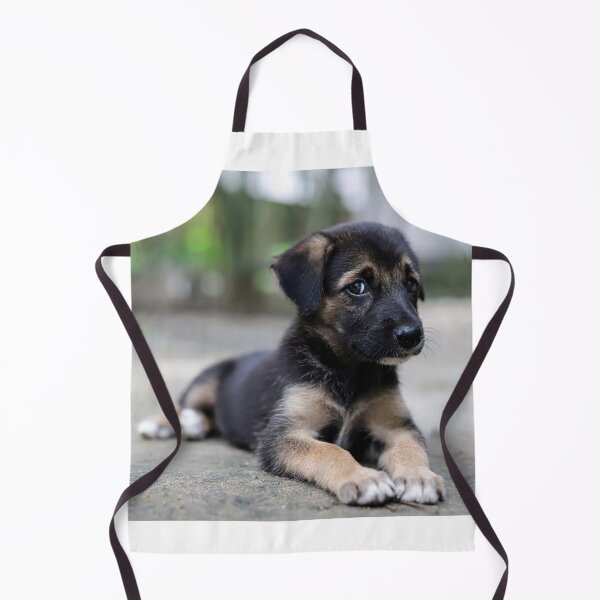 Item preview, A black confused looking puppy sitting on mud and looking at the camera designed and sold by FCEalin.
