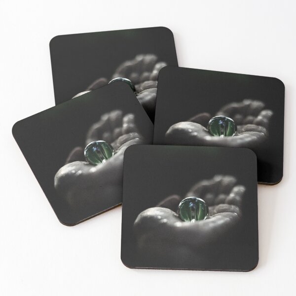 Item preview, A beautiful green transparent marble over hand in the darkness  designed and sold by FCEalin.