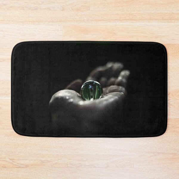 Item preview, A beautiful green transparent marble over hand in the darkness  designed and sold by FCEalin.