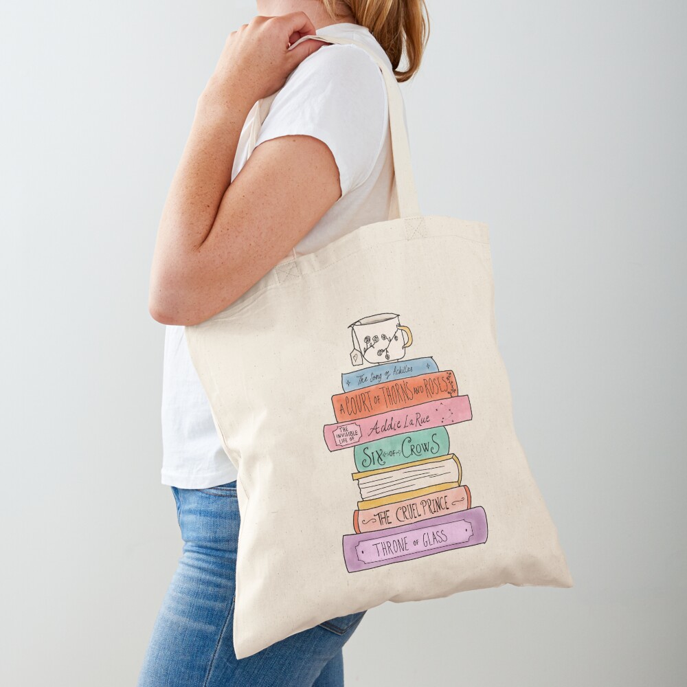 Discover YA fantasy book stack Tote Bags