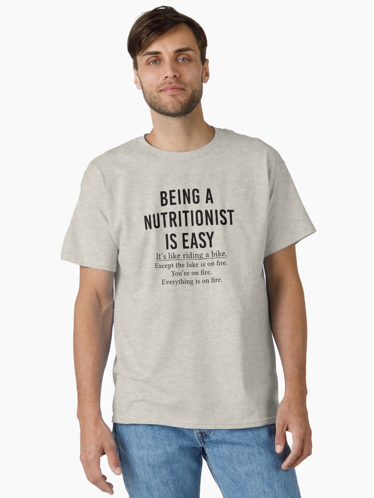 Thumbnail 1 of 7, Classic T-Shirt, Funny Nutritionist Gift Being A Nutritionist Is Easy designed and sold by kmcollectible.