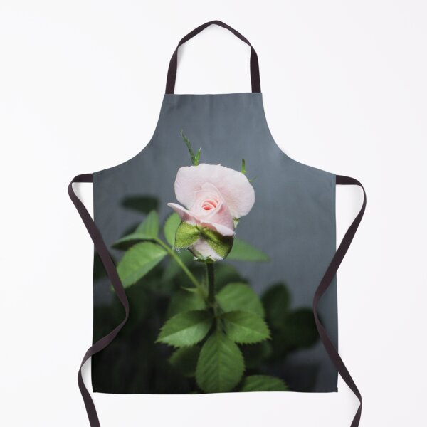 Item preview, a bud of a light pink rose with leaves on a gray background designed and sold by nataliavavilina.