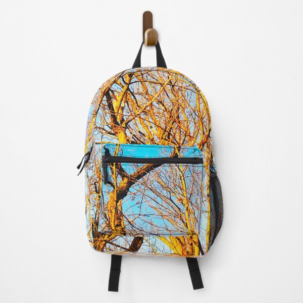 Item preview, Bare winter trees twisting and bending against the background of the blue cloudless sky designed and sold by helenkaiy.