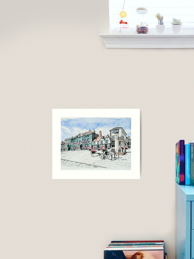 Thumbnail 1 of 3, Art Print, Angel Hill Bury St Edmunds Painting designed and sold by TomCrittenden.