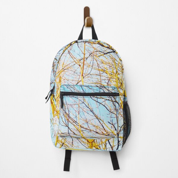Item preview, Bare winter trees twisting and bending against the background of the blue cloudless sky designed and sold by helenkaiy.
