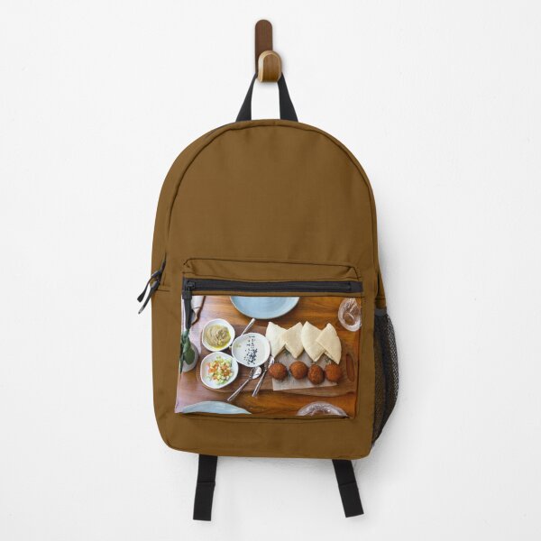 Item preview, Mediterranean Falafels with pita bread and dips on wooden background designed and sold by Rrrainbow.