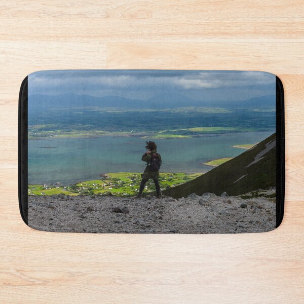 Item preview, The woman enjoys the view from top of the mountain Croagh Patrick, nicknamed the Reek in County Mayo after Mweelrea and Nephin, Ireland designed and sold by AlbertMi.