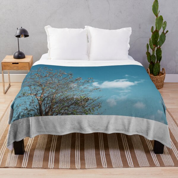Item preview, A tree in front of the light blue cloudy sky designed and sold by FCEalin.