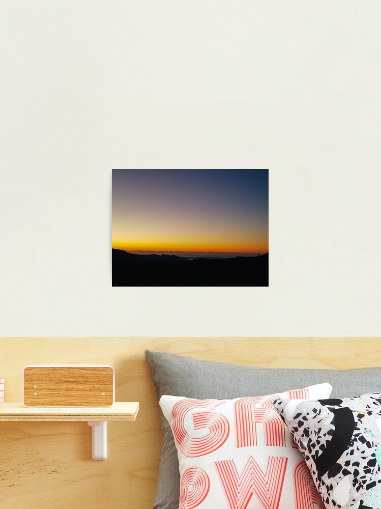 Thumbnail 1 of 3, Photographic Print, As the sun descends below the horizon, the sky is transformed into a canvas of breathtaking hues. Shades of pink, orange, and gold paint the sky, casting a warm and magical glow designed and sold by cokemann.