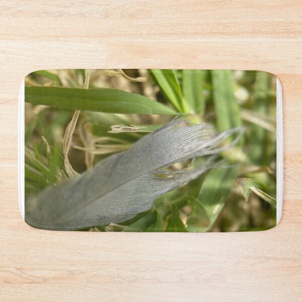 Item preview, Fallen Feather Resting On The Grass designed and sold by pinkyjainpan.