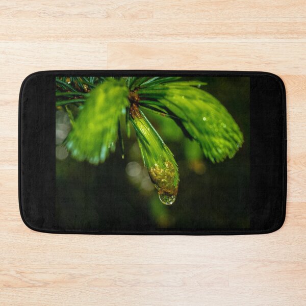 Item preview, Close up shot of reflective water drop on the pine branch in the Irish forest park morning time designed and sold by AlbertMi.