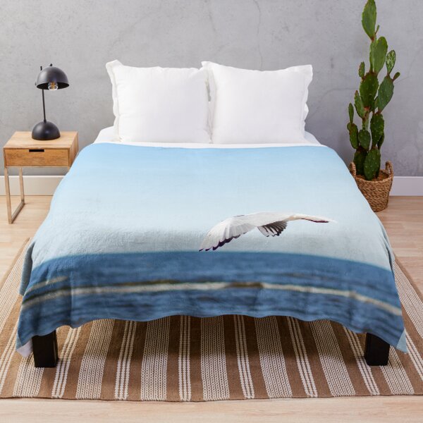 Item preview, White seagull flying in blue sky designed and sold by lena-maximova.