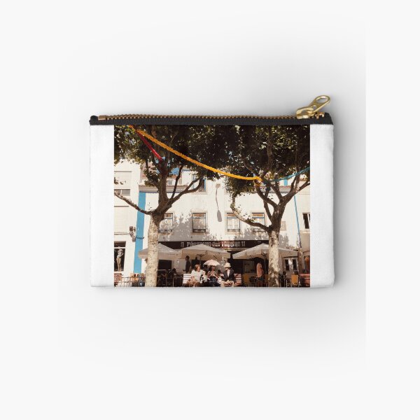 Item preview, Sitting Under The Umbrella In The Sun. Downtown Ericeira, Portugal designed and sold by Niklas Skyttä.