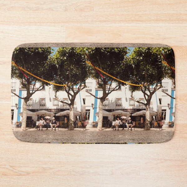Item preview, Sitting Under The Umbrella In The Sun. Downtown Ericeira, Portugal designed and sold by Niklas Skyttä.