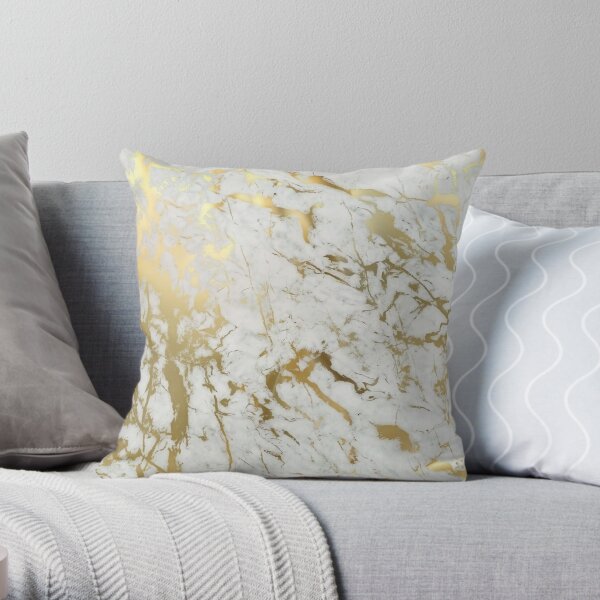 white and gold cushions