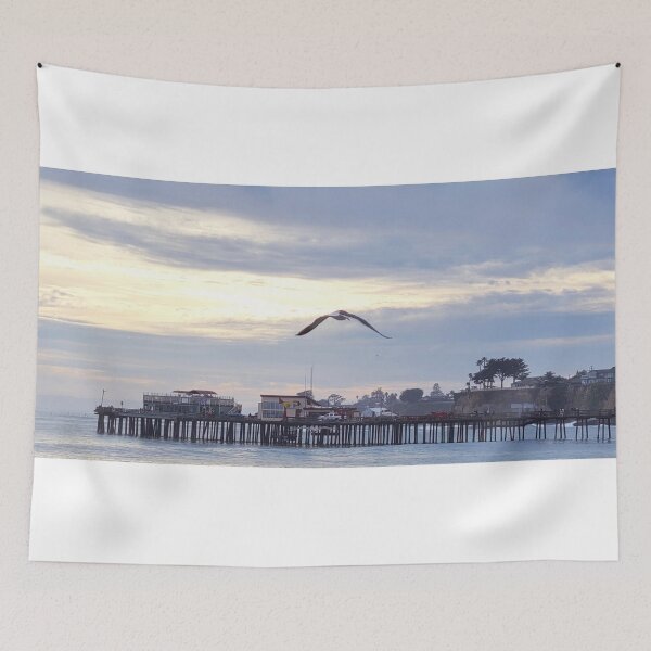 Item preview, Ocean pier with seagull at sunset designed and sold by teesonwheels.