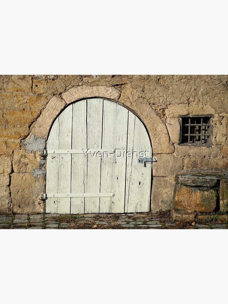 Gate to the vault cellar on a medieval building