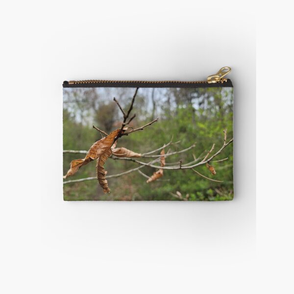 Item preview, Taking a picture being pulled by the branches and leaves that make you feel autumn fallen leaves while picking bracken in spring. Jeju Island, Korea. designed and sold by human8891.