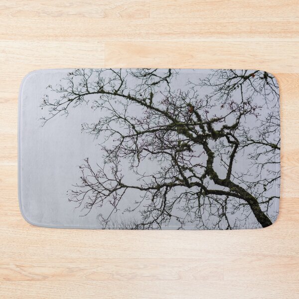 Item preview, Tree branches silhouette against grey dismal sky designed and sold by lena-maximova.
