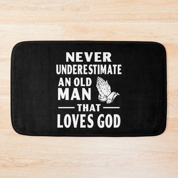 Item preview, never underestimate an old man that loves god religious designed and sold by baingraphics.