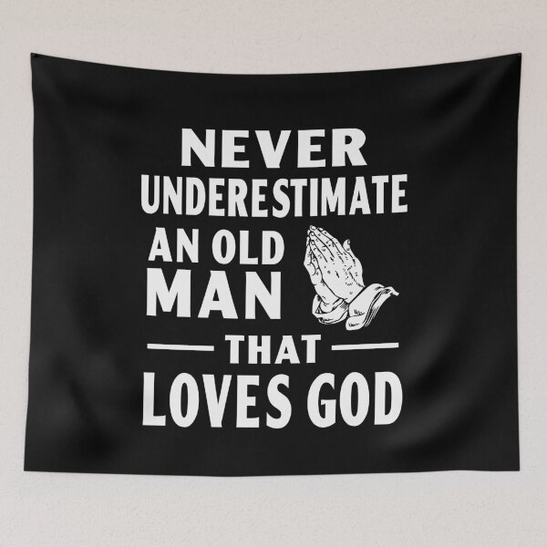 Item preview, never underestimate an old man that loves god religious designed and sold by baingraphics.