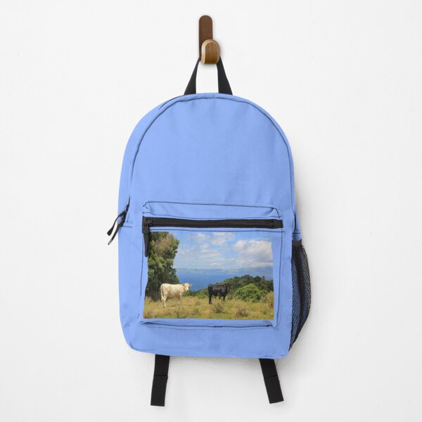 Item preview, Cute and funny looking cows with a great view over the Atlantic ocean, during hiking trail at the Azores island Pico, view to Sao Jorge island. designed and sold by AylaHarbich.