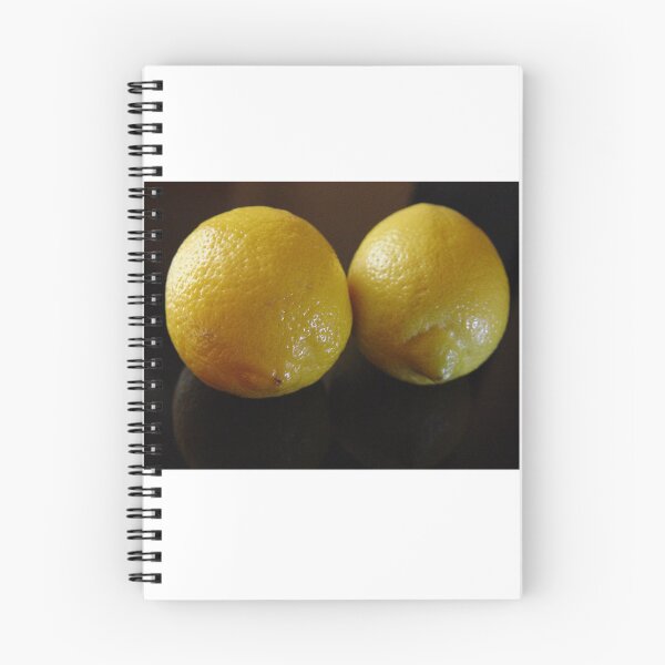 Item preview, two yellow lemons close-up on a black background designed and sold by Olga Kydryavskaya.