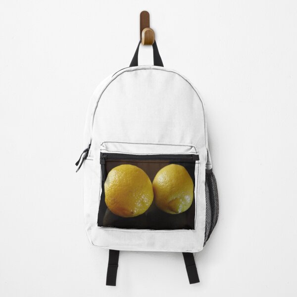 Item preview, two yellow lemons close-up on a black background designed and sold by Olga Kydryavskaya.