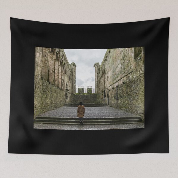Item preview, A woman exploring the interior of The Rock of Cashel, also known as Cashel of the Kings and St. Patrick's Rock, is a historic site located at Cashel, County Tipperary, Ireland designed and sold by AlbertMi.