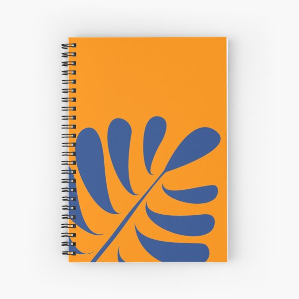 Gefiedertes Blatt blau auf orange Spiralblock