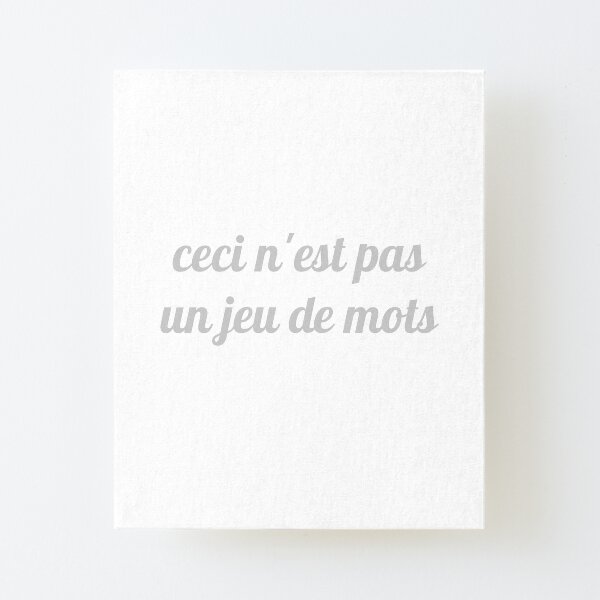 Magritte - Ceci n'est pas un jeu de mots Canvas Mounted Print