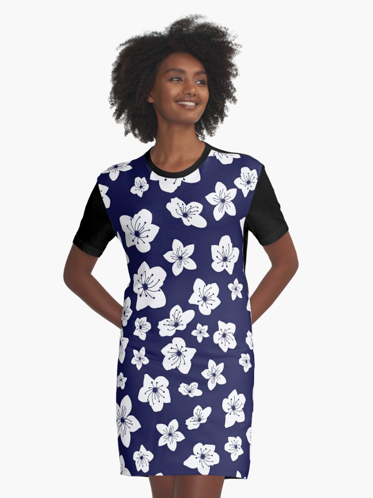 White dress with navy blue outlet flowers