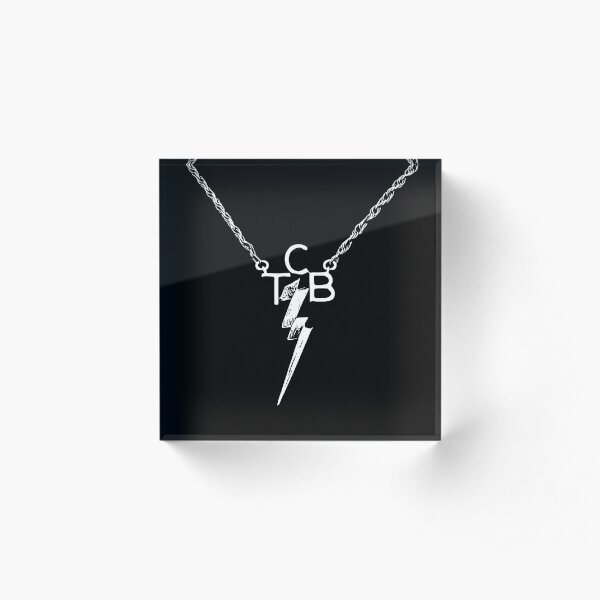 TCB” Necklace in Sterling-Silver, gold plated owned by Elvis Presley – Rock  Art Collection by L'Unique Foundation